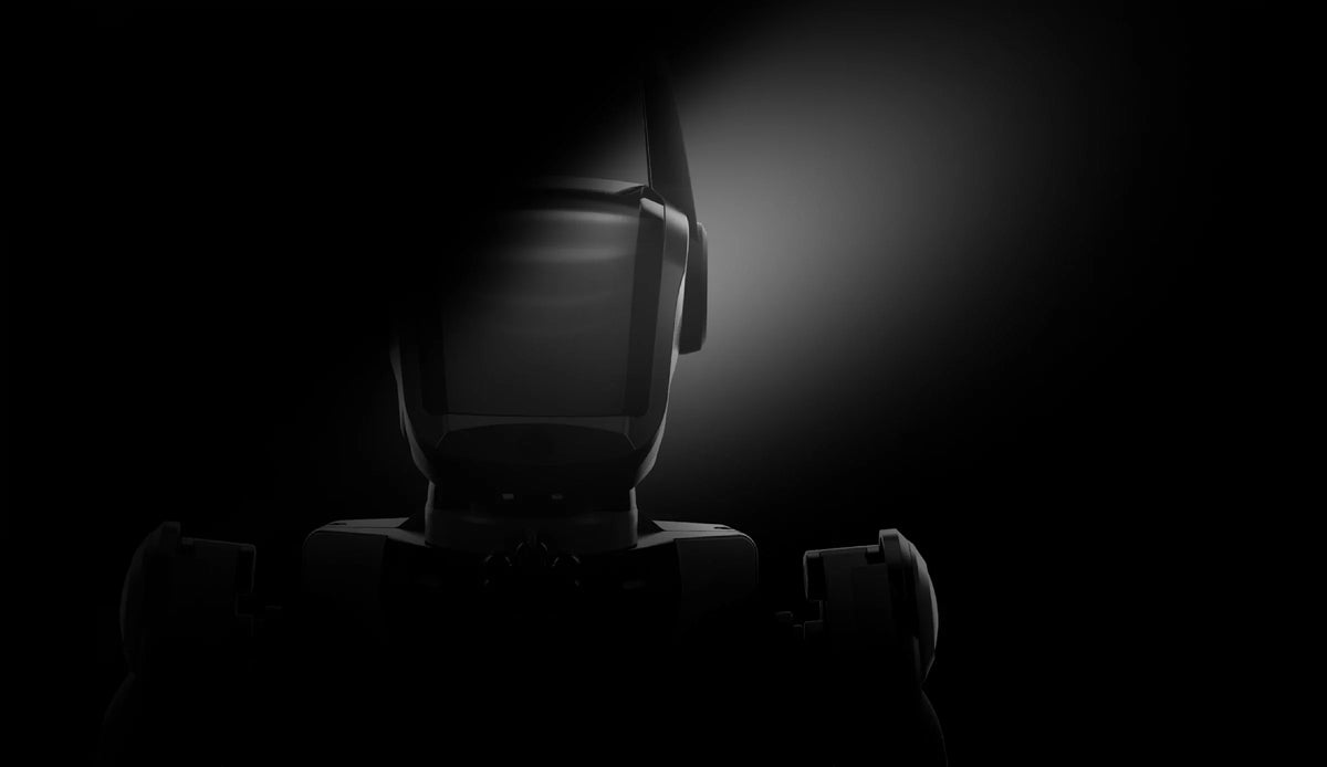 Front silhouette of a Hengbot Sirius robot dog with its head illuminated against a dark background.
